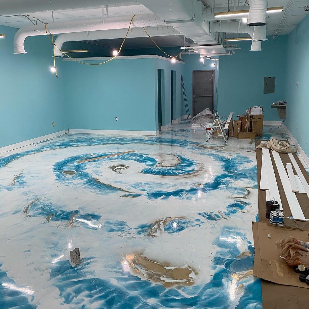 Decorative blue and white floor design in the existing project gallery
