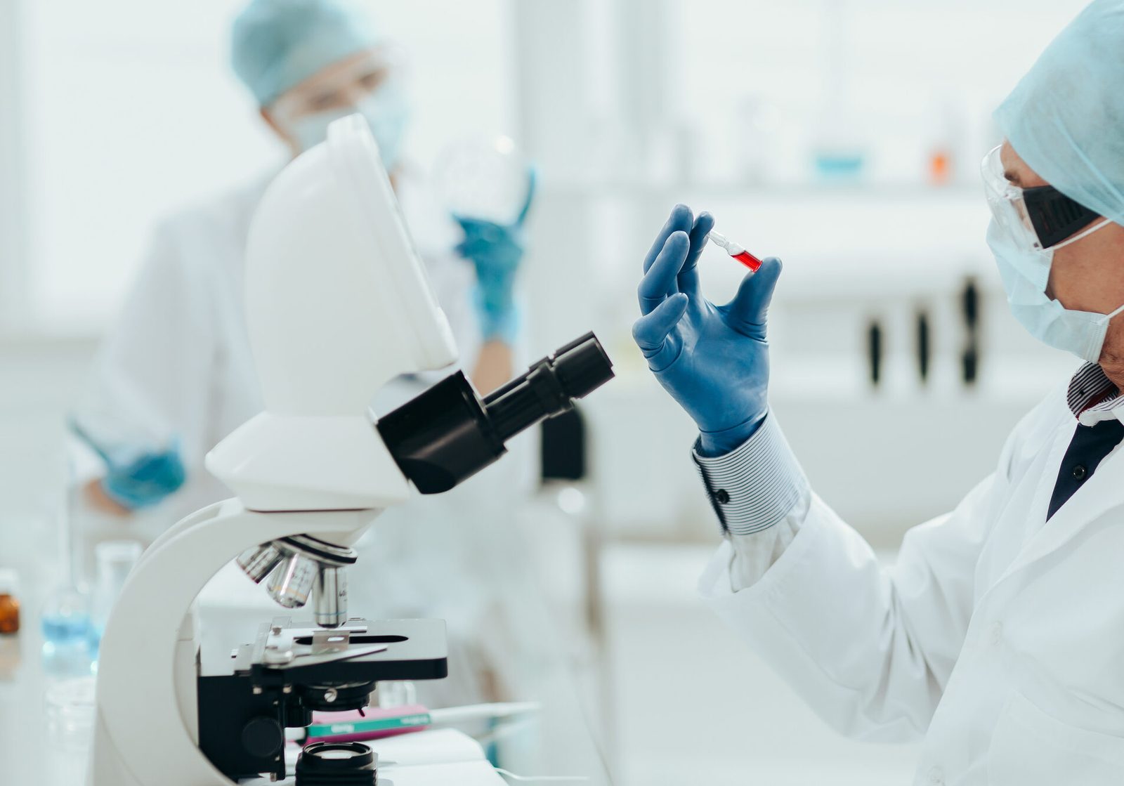 A scientist holding a new vaccine