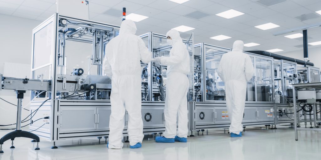 Scientist Wearing Sterile Protective Coverall Set's up