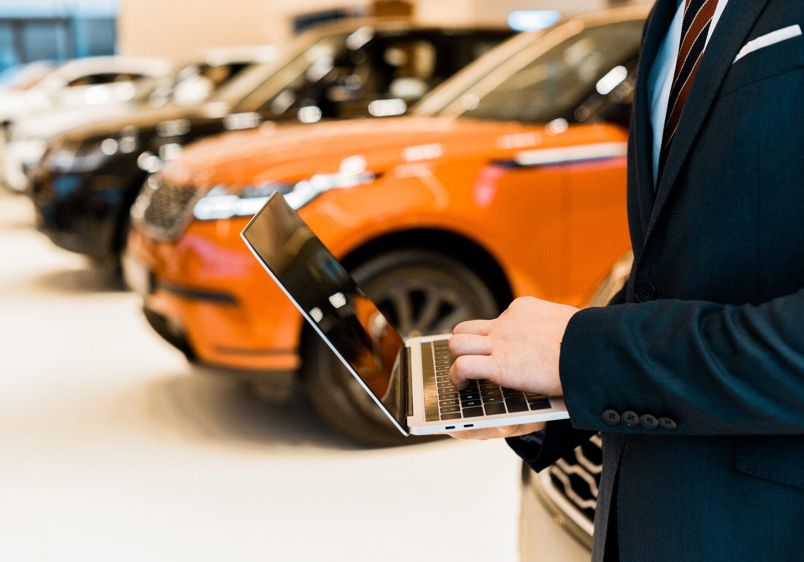 a man hold a laptop